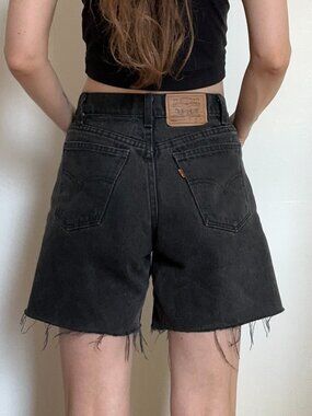 Great black vintage denim shorts, orange tab by Levi's. Size 27, model 560.
